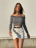 Gonna in ecopelle con zip laterale bianca