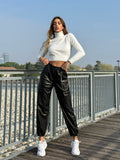 Pantalone in ecopelle con catenina nero