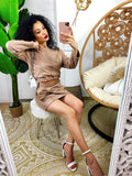 Completo in ecopelle top e gonna camel