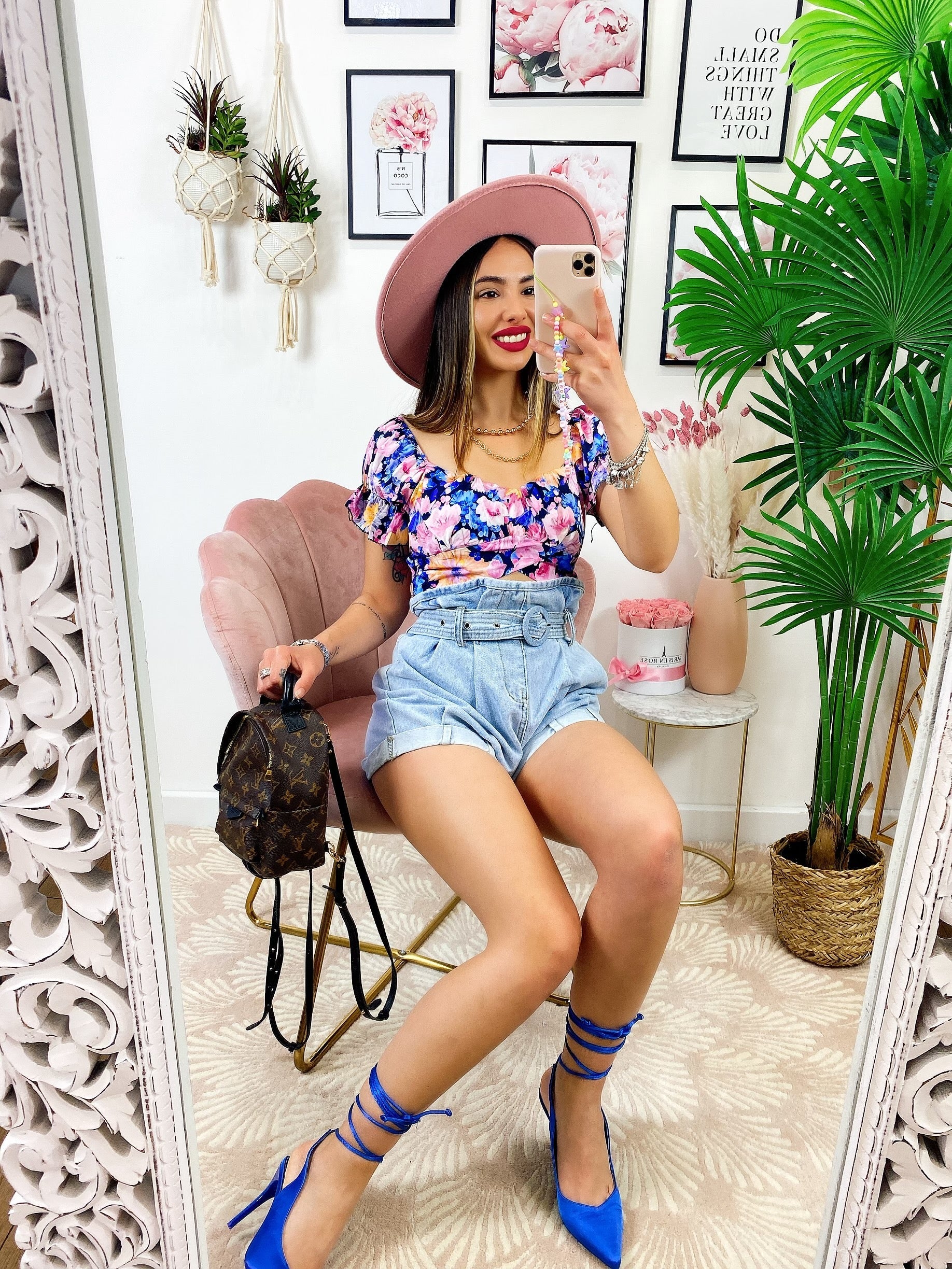 Top floreale con cintura