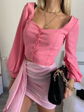 Top con bottoncini rosa