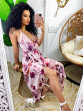 Abito con gonna asimmetrica e fiorellini rosa