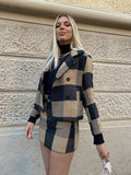 Giacca in tweed check marrone
