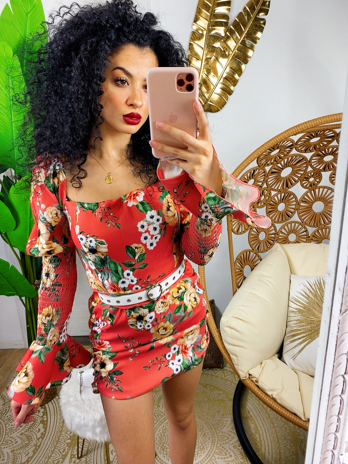 Tubino con fiori aranciati manica bombata