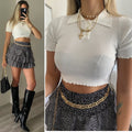 Top crop bianco con bottoncini