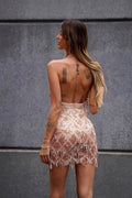 Abito con frange e paillettes rosa gold