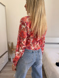Camicia floreale corallo