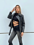Top nero a costine con lacci