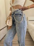 Jeans con cuore e strass
