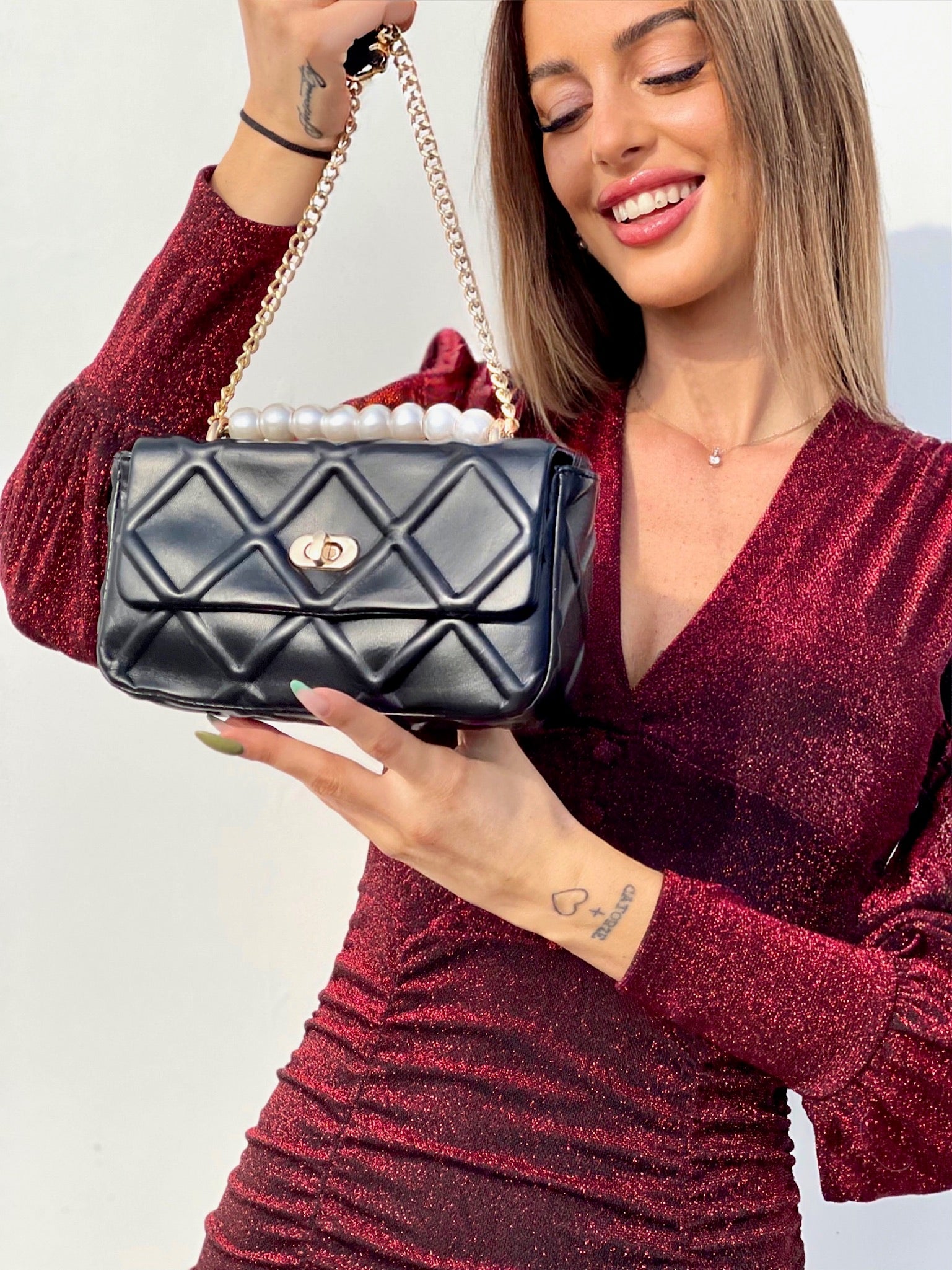 Borsa nera con perle