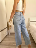 Jeans con cuore e strass