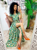 Abito lungo con maxi spacchi a fiori base verde