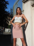 Gonna aderente rosa con bottoni