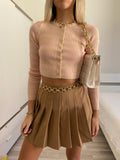 Maglioncino crop a righe nude