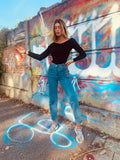 Top a costine con scollo a V
