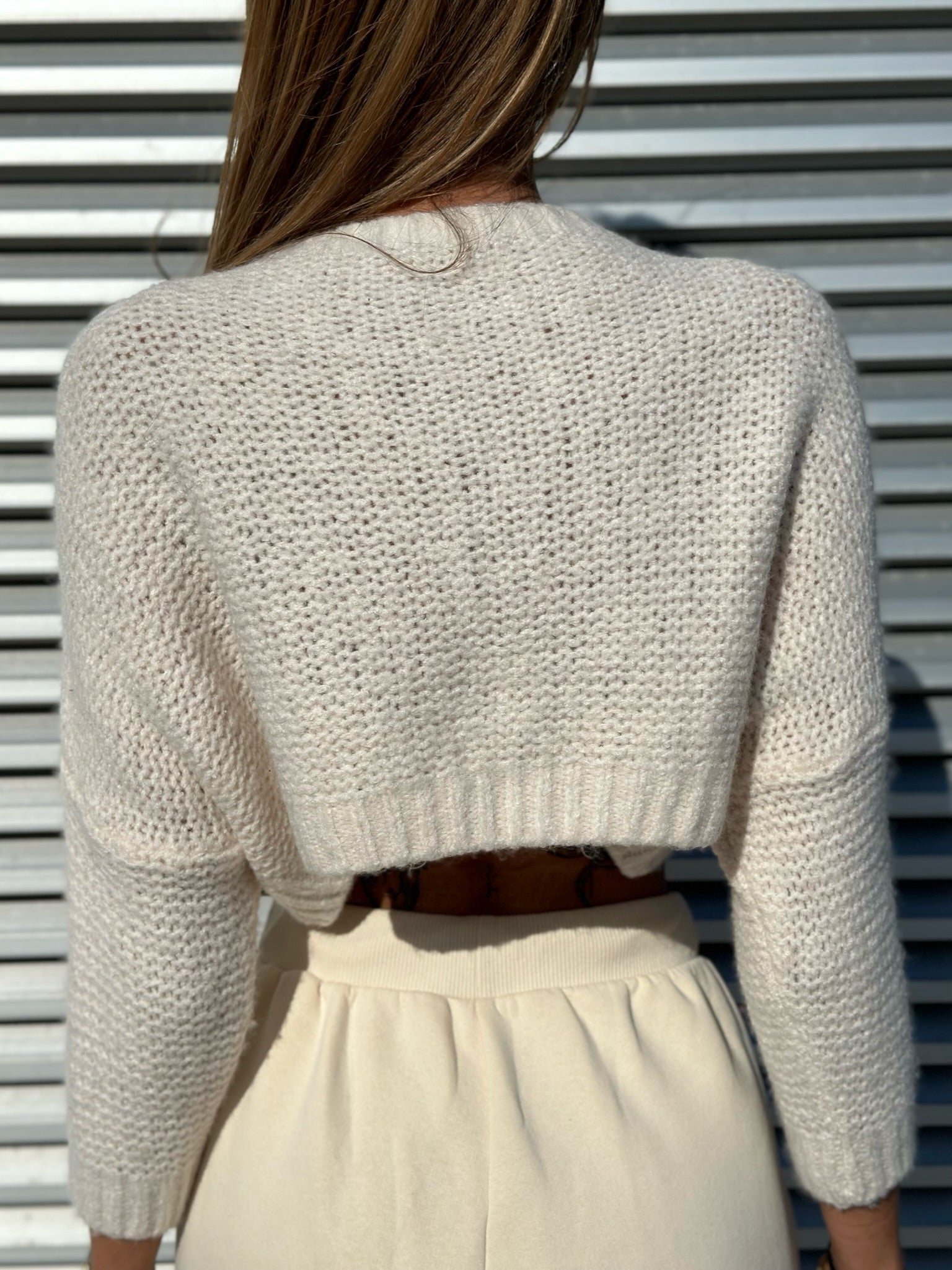 Maglioncino crop panna a trecce