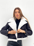 Montone nero con pelo bianco