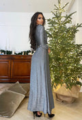 Abito glitter argento polvere con spacco