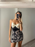 Body con fiocco