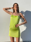 Abito in raso lime con dettaglio luce