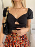 Top Nero con incroci