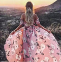 Abito lungo con scollo a barchetta a fiori rosa