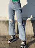 Jeans wide leg con strappi e dettaglio