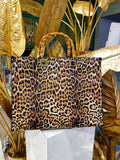 Maxi bag maculata con manico in legno