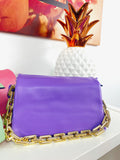 Pochette a mano con catena colori accesi