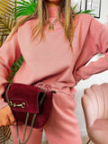 Completo maglia e pantalone rosa