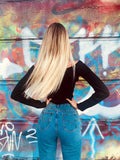 Top a costine con scollo a V