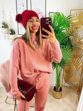 Completo maglia e pantalone rosa