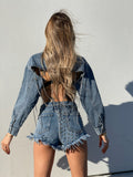 Short jeans con borchie