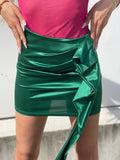 Gonna in raso verde smeraldo