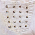 Vintage bianco con borchie a caramella