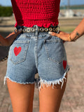 Short a caramella con cuori rossi