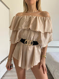 Tutina beige scollo a barchetta e balze