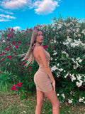 Abito aderente incrocio sul collo nude