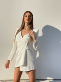 Abito a blazer con bottone bianco
