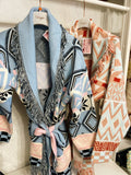 Cardigan frange e cinta celeste