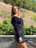 Maglione nero con lacci