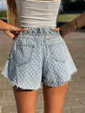 Short jeans a farfalla con strappini