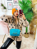 Cappello arancione con C