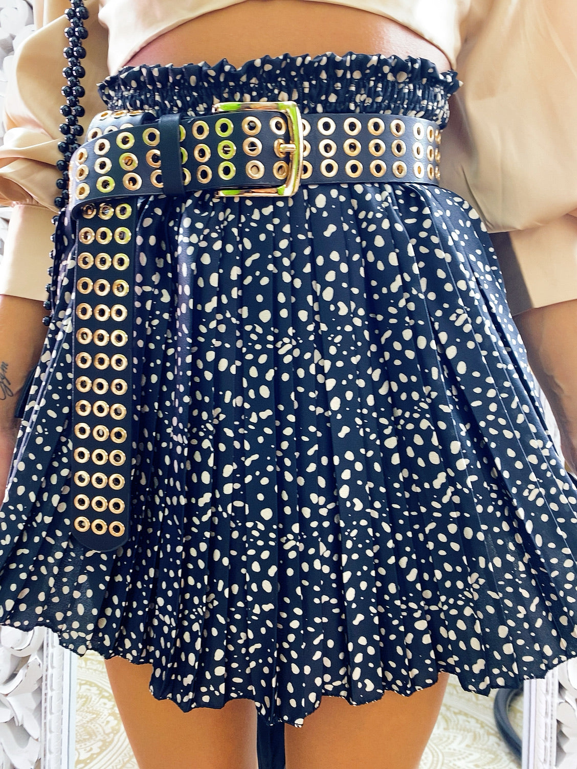 Gonna a pieghine nera con pois