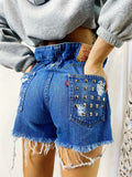 Short Levi’s Vintage bagno scuro con borchie