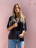 Blusa o kimono con frange