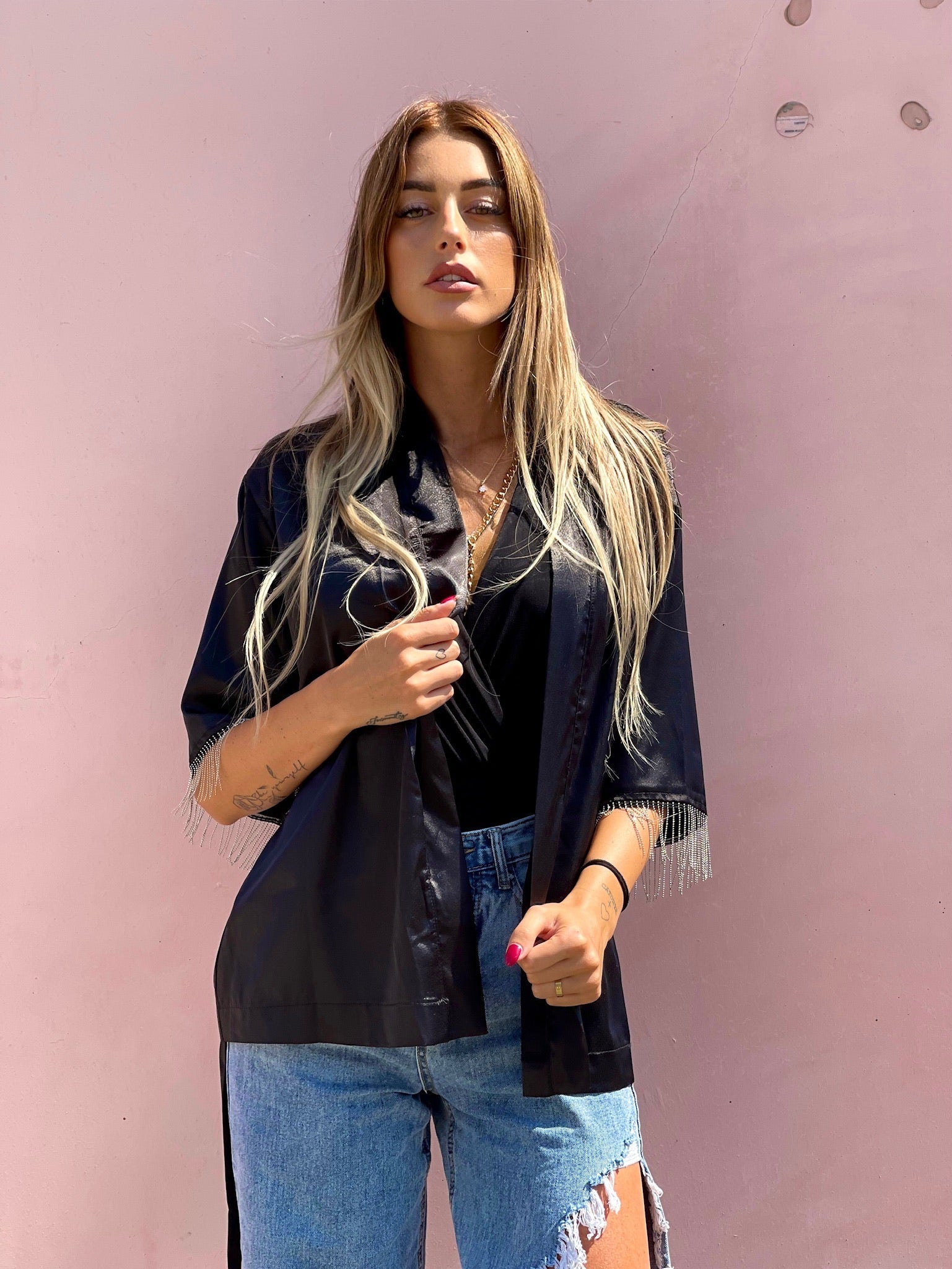 Blusa o kimono con frange