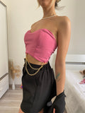 Top rosa con catene oro