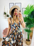 Tuta floreale con pantalone a pieghine