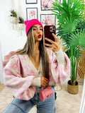 Cardigan maculato rosa con gioiello